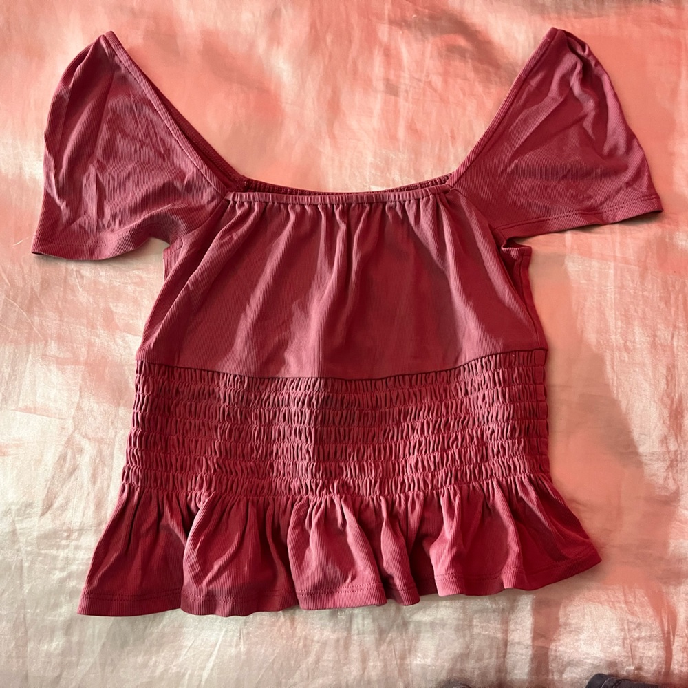Two off the shoulder shirts